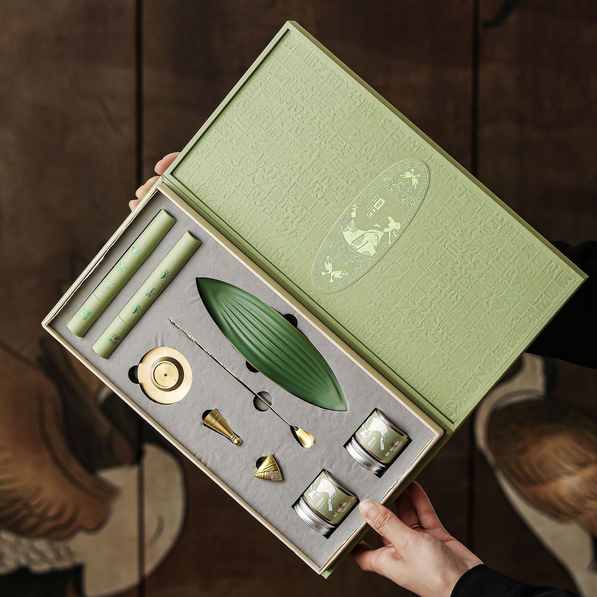 Open Green Leaf gift box showing the incense and tools included