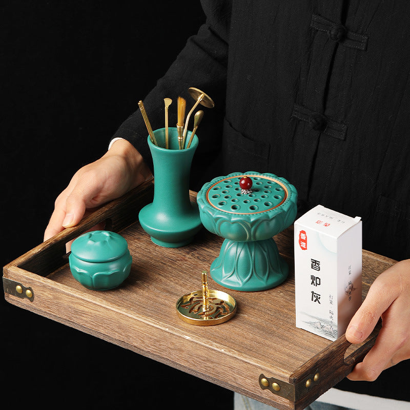 Jade green lotus incense kit arranged on a display tray