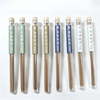 Botanical incense collection showing several glass tubes; each incense option is one 10 g tube