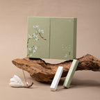 Sage green Magnolia Garden gift set with two incense packs and a sculpted flower holder