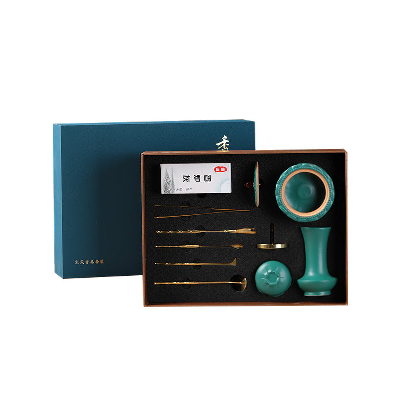 Open gift box showing the jade green incense kit