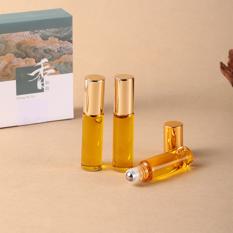 Kalimantan roll-on bottle and cap detail; purchase includes one bottle